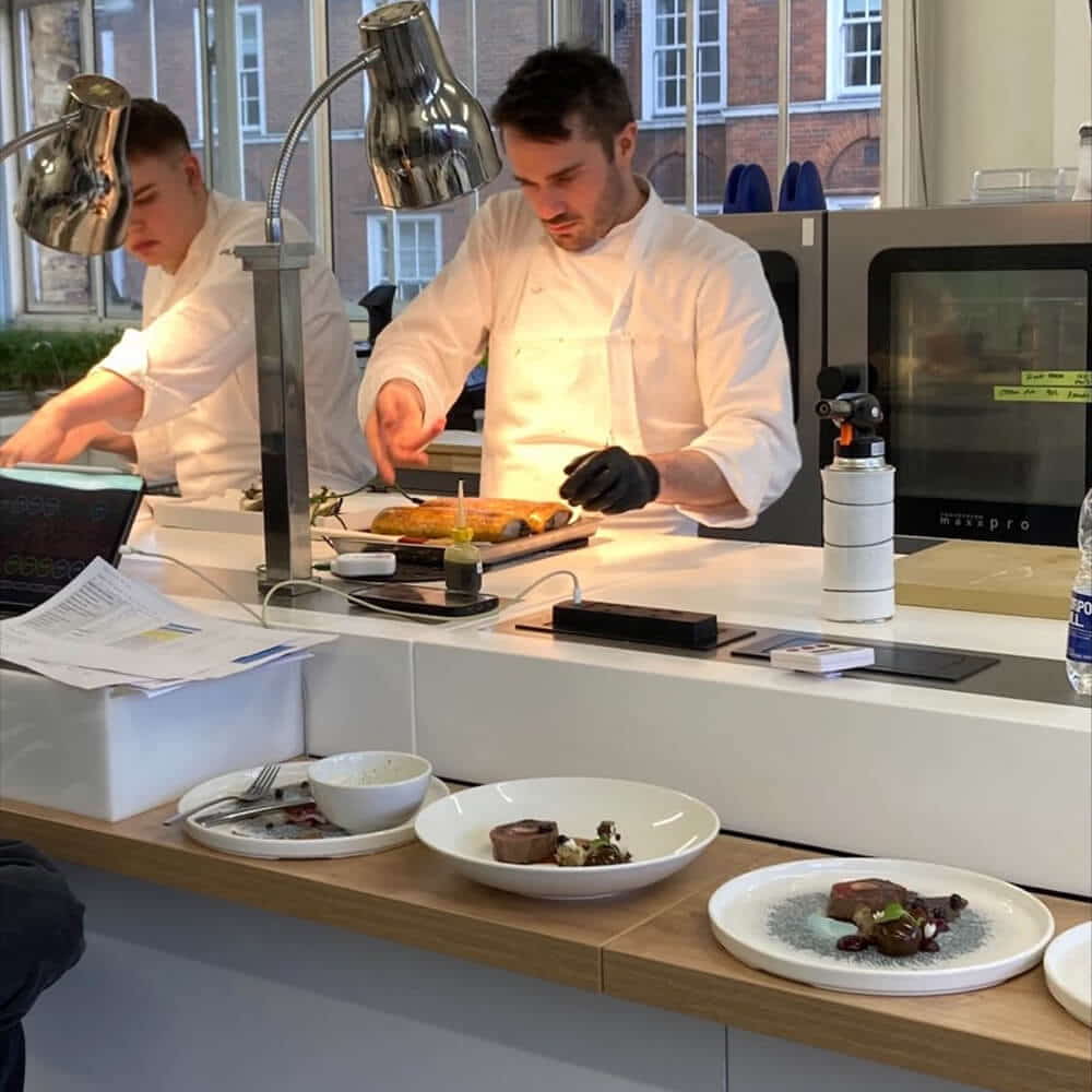 Tom Phillips Plating up Dish for Bocuse D'Or
